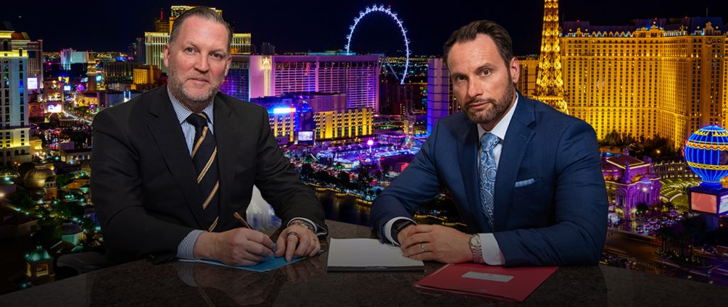 Bradley Hofland and Josh Tomsheck with the Las Vegas skyline in the background.